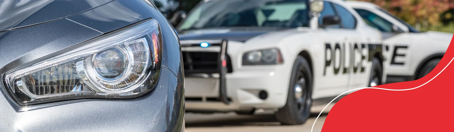 Car with police car behind
