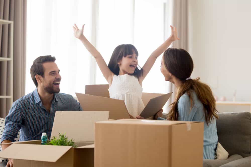 happy family in their new oregon hom with renters insurance cost