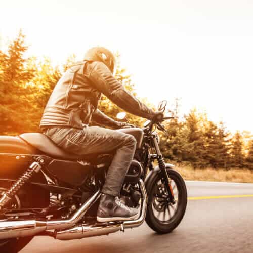 Close up of a high power motorcycle on the road with insurance