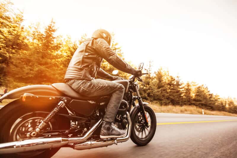 Close up of a high power motorcycle on the road with insurance