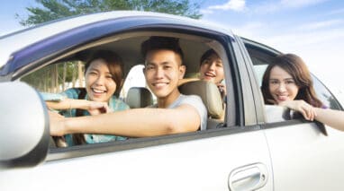 Young people having fun driving