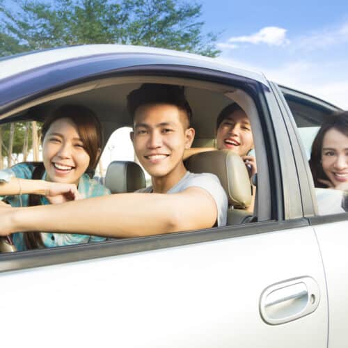 Young people having fun driving