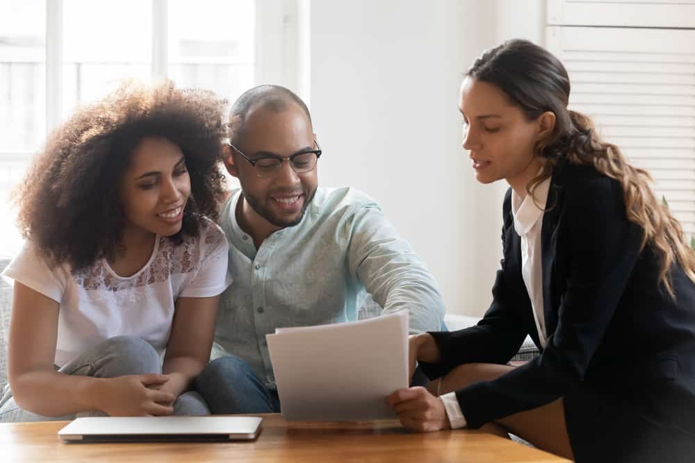 couple meeting with insurance agent