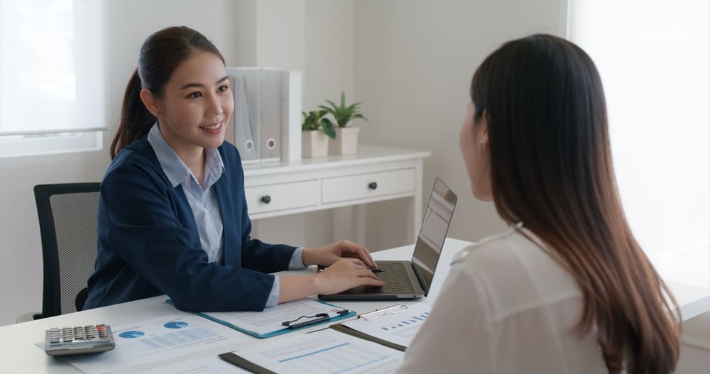 insurance agent speaking with customer