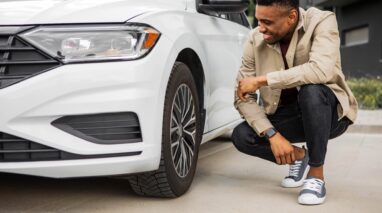 African American man checks his tires