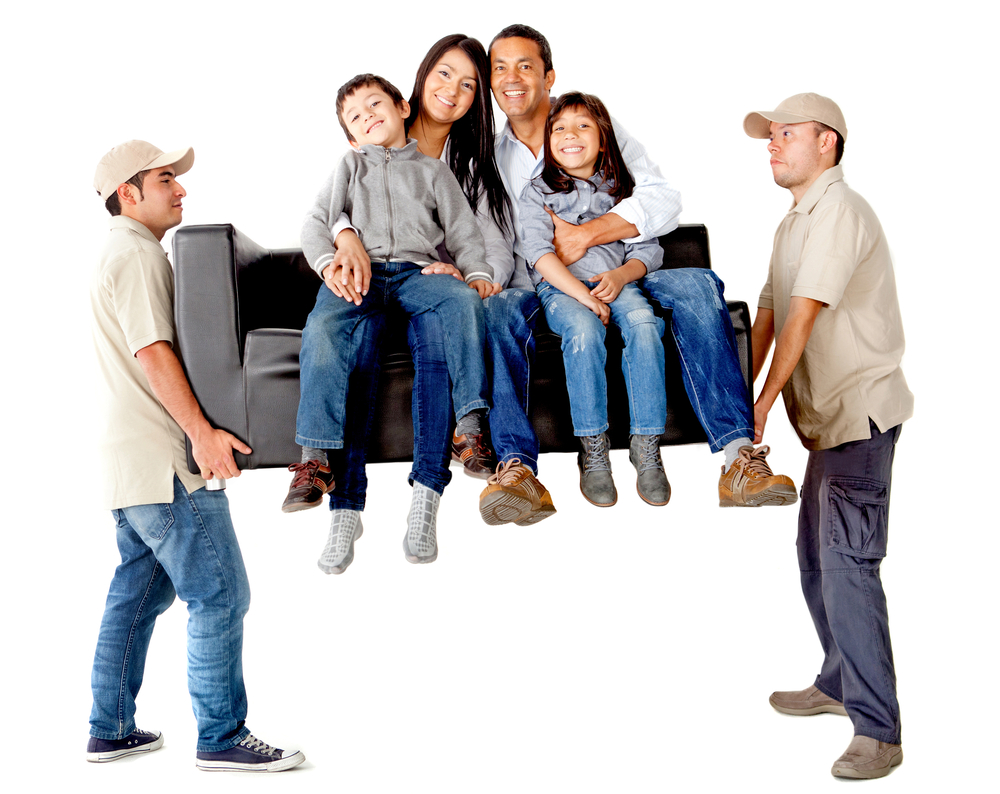 Smiling family sitting on couch that two professional movers are carrying.
