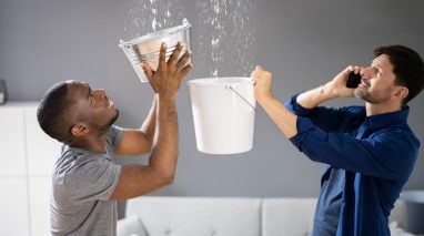 Roommates try to capture water from a leaky roof in Washington.