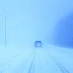 Car on Snow-Covered Road